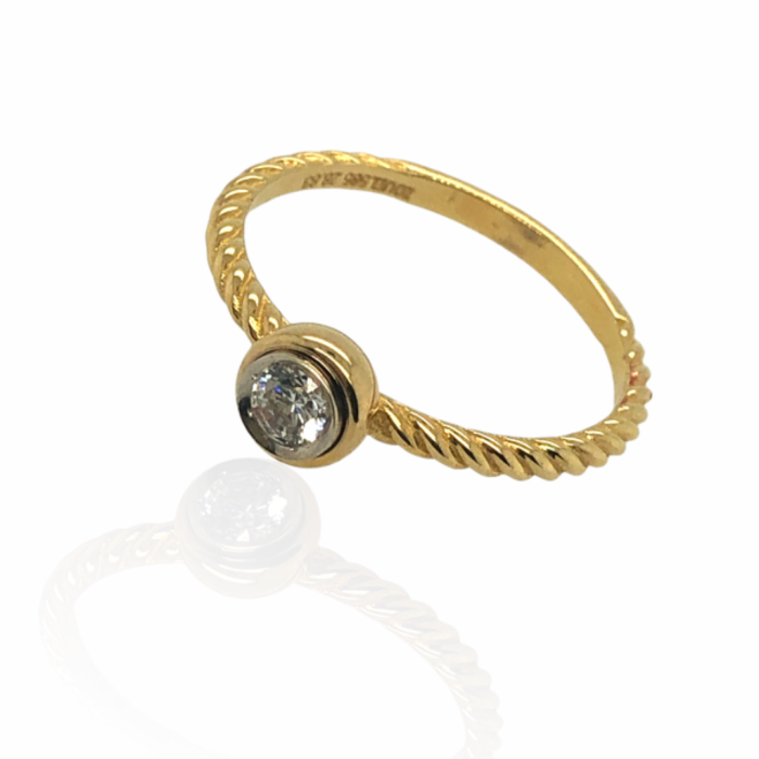 Χρυσό μονόπετρο δαχτυλίδι, 14 καρατίων, με λευκόχρυσο καστόνι στο λευκό ζιργκόν και στριφτή γάμπα